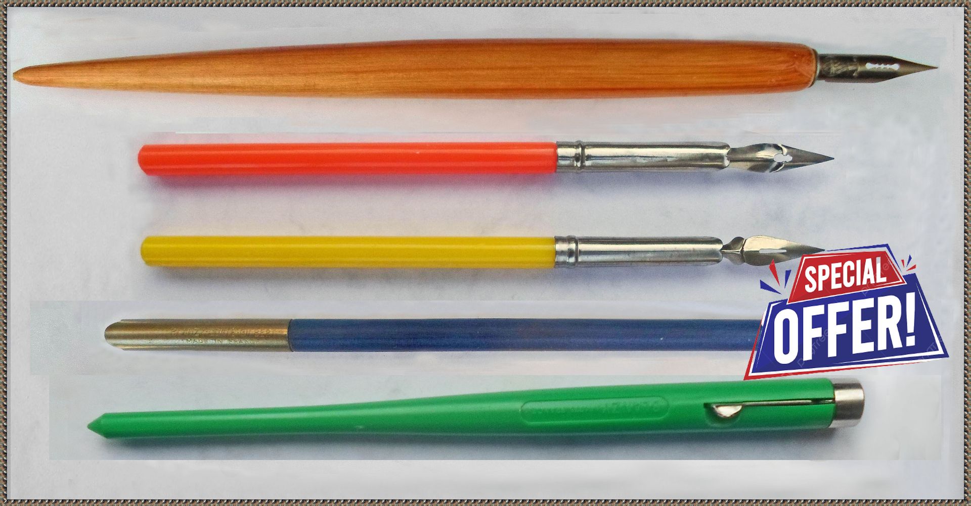 A collection of 5 vintage pen holders